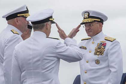 SAN DIEGO (Sept. 27, 2019) Vice Adm. Scott D. Conn, center, salutes Chief of Naval Operations (CNO) Adm. Michael M. Gilday, right, after receiving command of U.S. 3rd Fleet during a change of command and retirement ceremony aboard the Nimitz-class aircraft carrier USS Theodore Roosevelt (CVN 71), Sept. 27, 2019. Conn assumed command from Vice Adm. John D. Alexander, who retired after 37 years of honorable service. U.S. Navy photo by MC3 Casey Trietsch.
