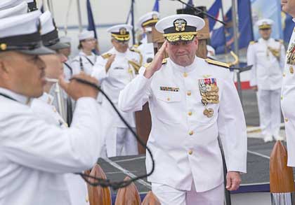 SAN DIEGO (Sept. 27, 2019) Vice Adm. John D. Alexander is piped ashore after relinquishing command of U.S. 3rd Fleet to Vice Adm. Scott D. Conn during a change of command and retirement ceremony aboard the Nimitz-class aircraft carrier USS Theodore Roosevelt (CVN 71), Sept. 27, 2019. Alexander retired after 37 years of honorable service. U.S. Navy photo by MC3 Timothy Heaps.