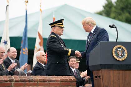 President Donald J. Trump shakes hands with Army Gen. Mark A. Milley upon the latter’s assumption of office as the 20th chairman of the Joint Chiefs of Staff during a ceremony at Joint Base Myer-Henderson Hall, Va., Sept. 30, 2019.