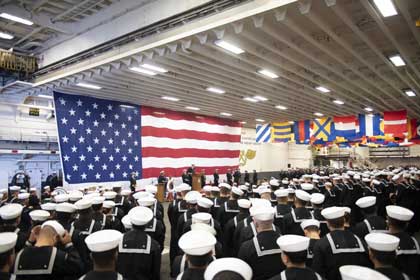 SAN DIEGO (Feb. 11, 2020) USS Boxer™s (LHD 4) crew gather in the hangar bay during Boxer™s 25th anniversary celebration. Boxer was commissioned on Feb. 11th, 1995 in Pascagoula, Miss. U.S. Navy photo by MC2 Justin Daniel Rankin