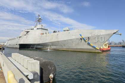 SAN DIEGO (June 22, 2022) Independence-variant littoral combat ship Pre-Commissioning Unit Canberra (LCS 30) arrives at its homeport of San Diego for the first time. LCS are fast, agile, mission-focused platforms designed to operate in near-shore environments, winning against 21st-century coastal threats. LCS are capable of supporting forward presence, maritime security, sea control, and deterrence.(U.S. Navy photo by MC2 Vance Hand.