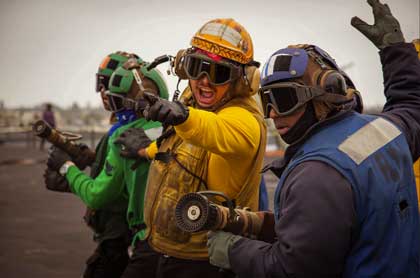 Carrier Drill: Sailors participate in a crash and salvage drill on the flight deck of the aircraft carrier USS Carl Vinson in San Diego, May 2, 2024.Photo by Navy Seaman Kenneth Ostas. 
