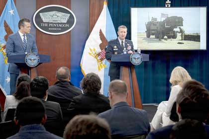 Secretary of War Pete Hegseth, left, and Air Force Gen. Dan Caine, chairman of the Joint Chiefs of Staff, hold a press briefing at the Pentagon, April 8, 2026, to discuss the ceasefire between the U.S. and Iran. Photo credit: Benjamin Applebaum, DOW 